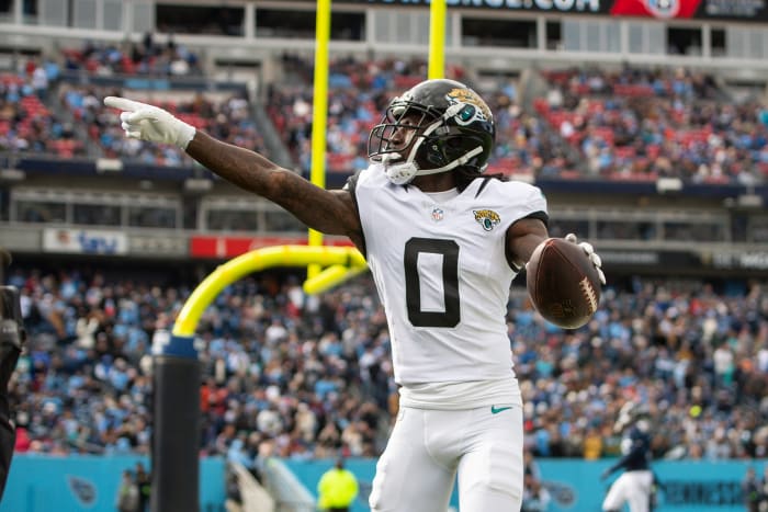Jan 7, 2024; Nashville, Tennessee, USA; Jacksonville Jaguars wide receiver Calvin Ridley (0) reacts after scoring a touchdown against the Tennessee Titans during the first half at Nissan Stadium.